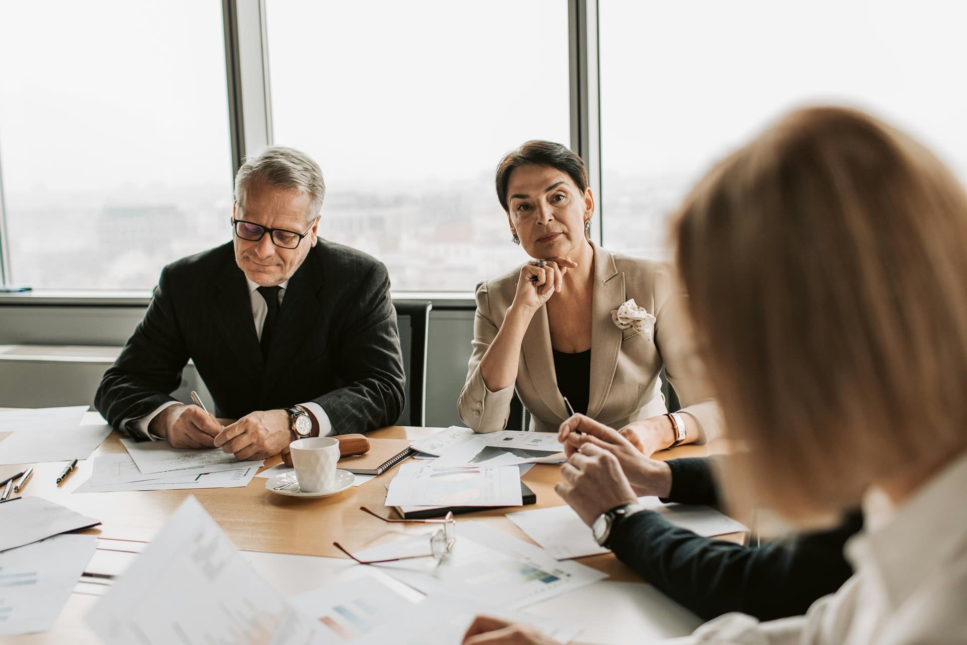 Technology executives discussing CTO vs CIO strategy