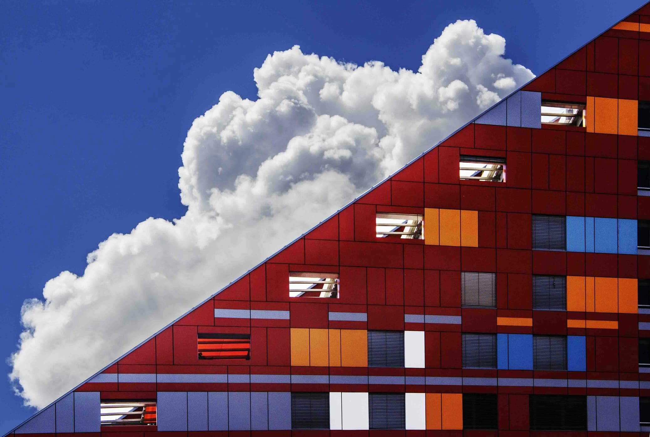 Modern office building with colorful geometric patterns representing cloud-smart strategy transition