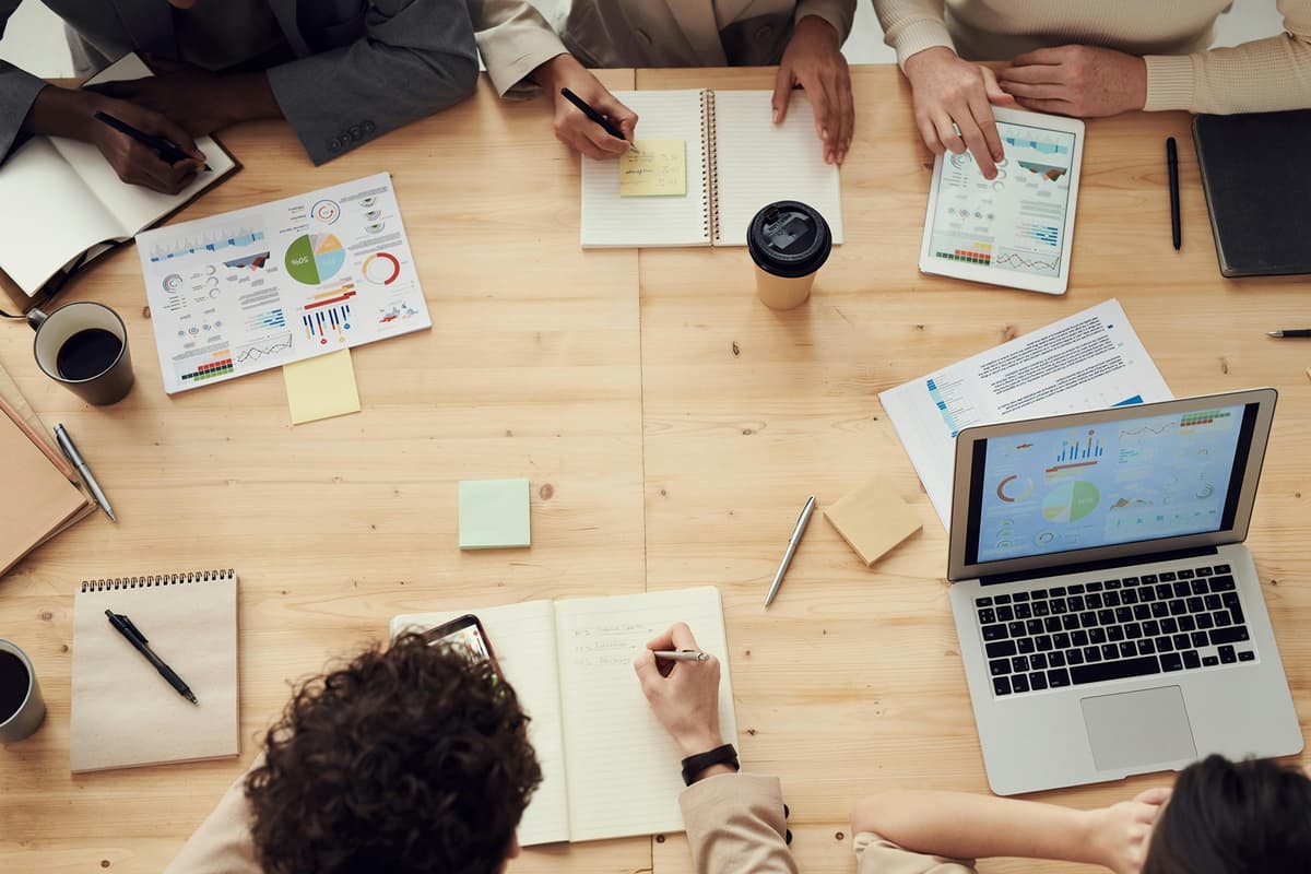Cybersecurity analyst reviewing security maturity dashboard from above